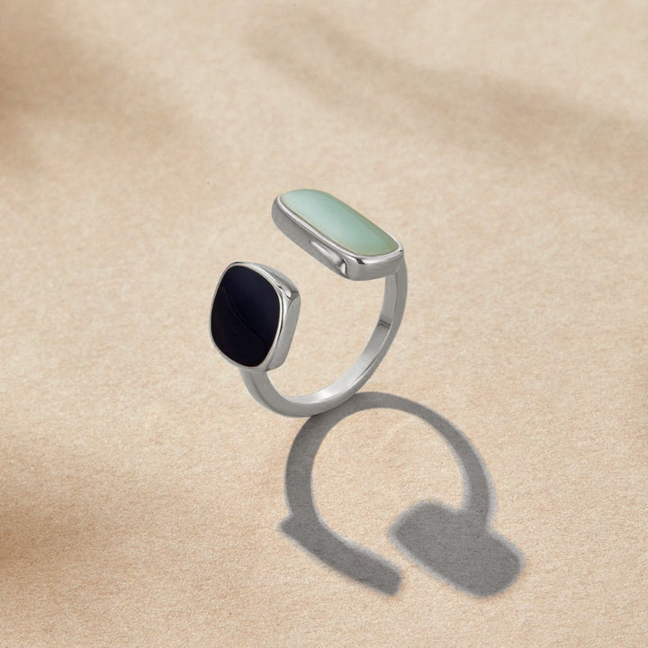 Anillo Envolvente de Acero Plateado con Aquamarina