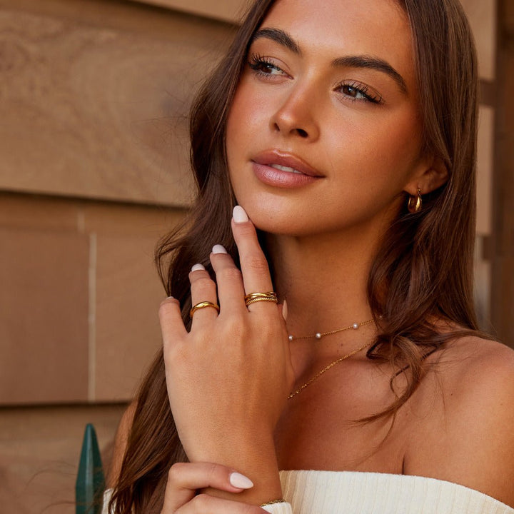 Anillo Cruzado Torcido Ara