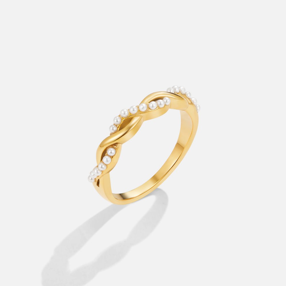 Anillo de Perlas con Giro Elegante