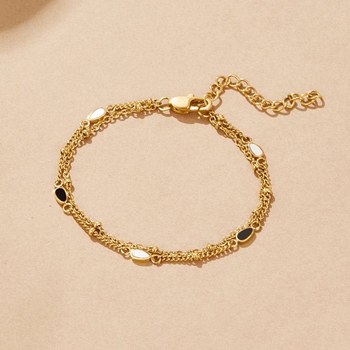 Pulsera de Piedra Negra y Blanca en Capas