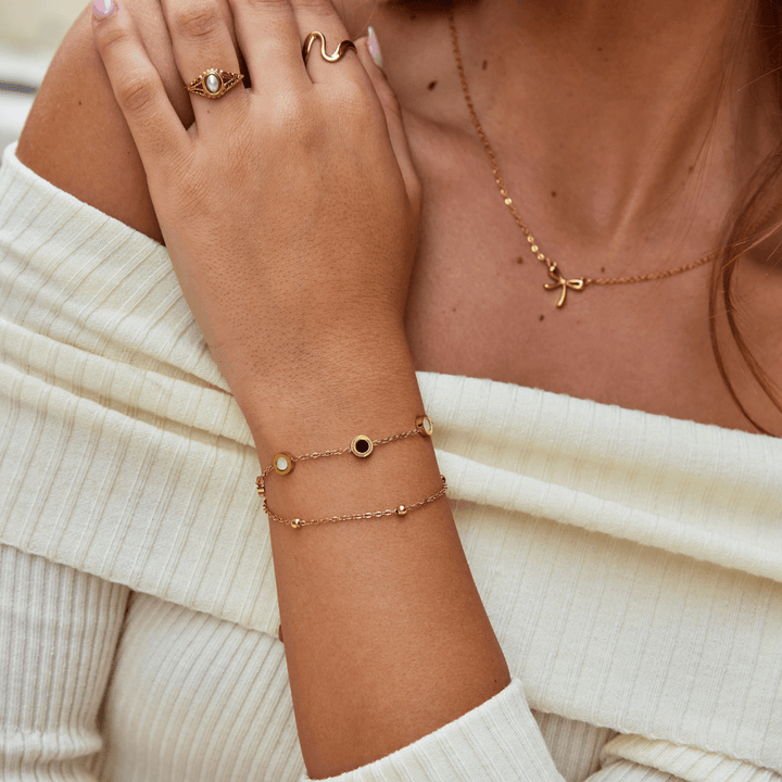 Pulsera de Onyx y Piedra Blanca